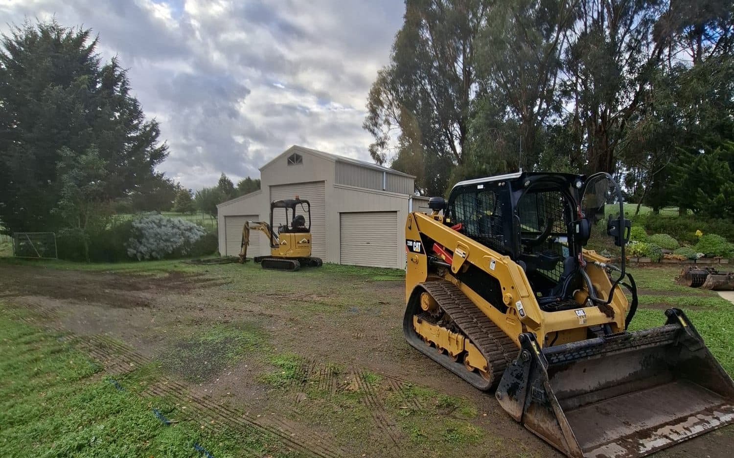 concrete driveway poured over a prepared base on a residential driveway job